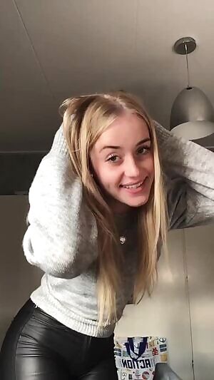 Teen in tight leather pants