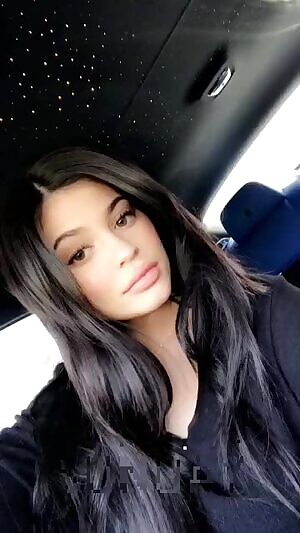 In her car