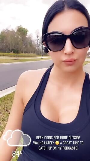 Billie wearing two sports bras and her tits still look huge